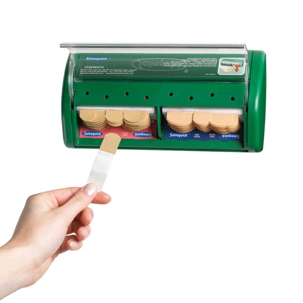 Pleister automaat waar een pleister uit wordt getrokken.